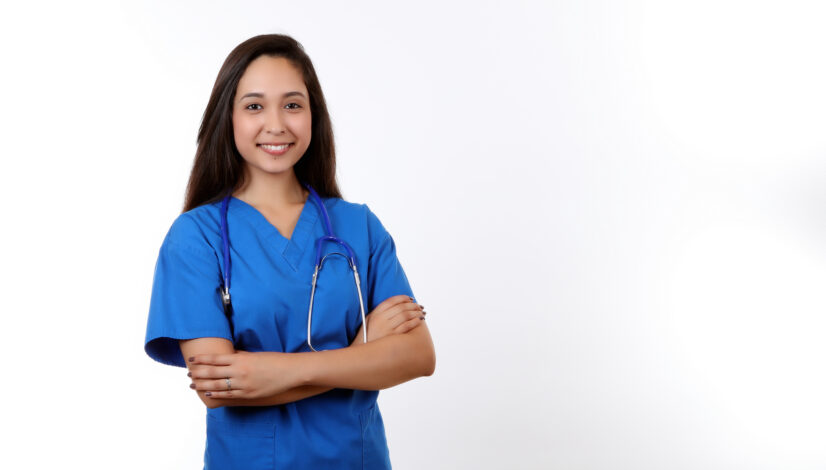 Friendly Medical Assistant in Blue Scrubs