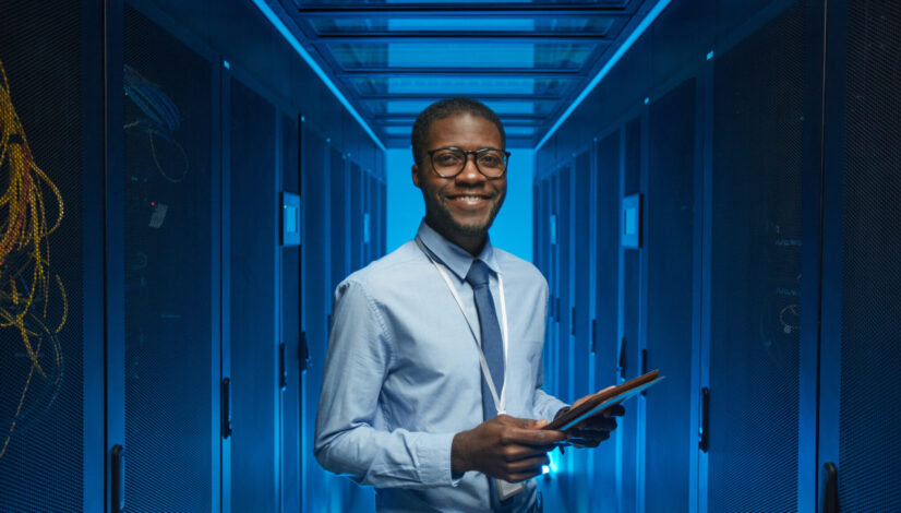 Smiling African American Man in Data Center